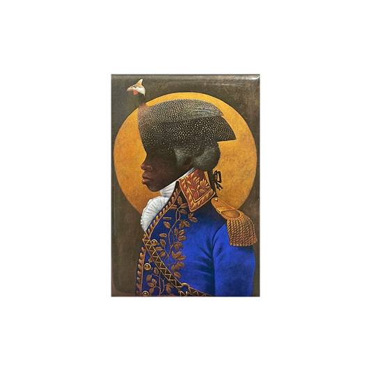 A laminated fridge magnet featuring a portrait of Toussaint L'Ouverture, a Haitian general, in a blue uniform with gold accents against a dark background.
