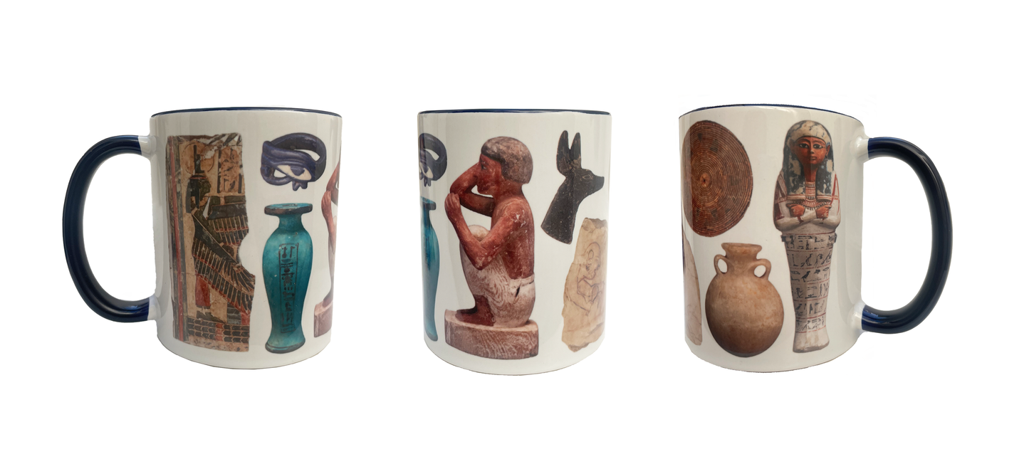 Three ceramic mugs with Egyptian-themed designs on a white background