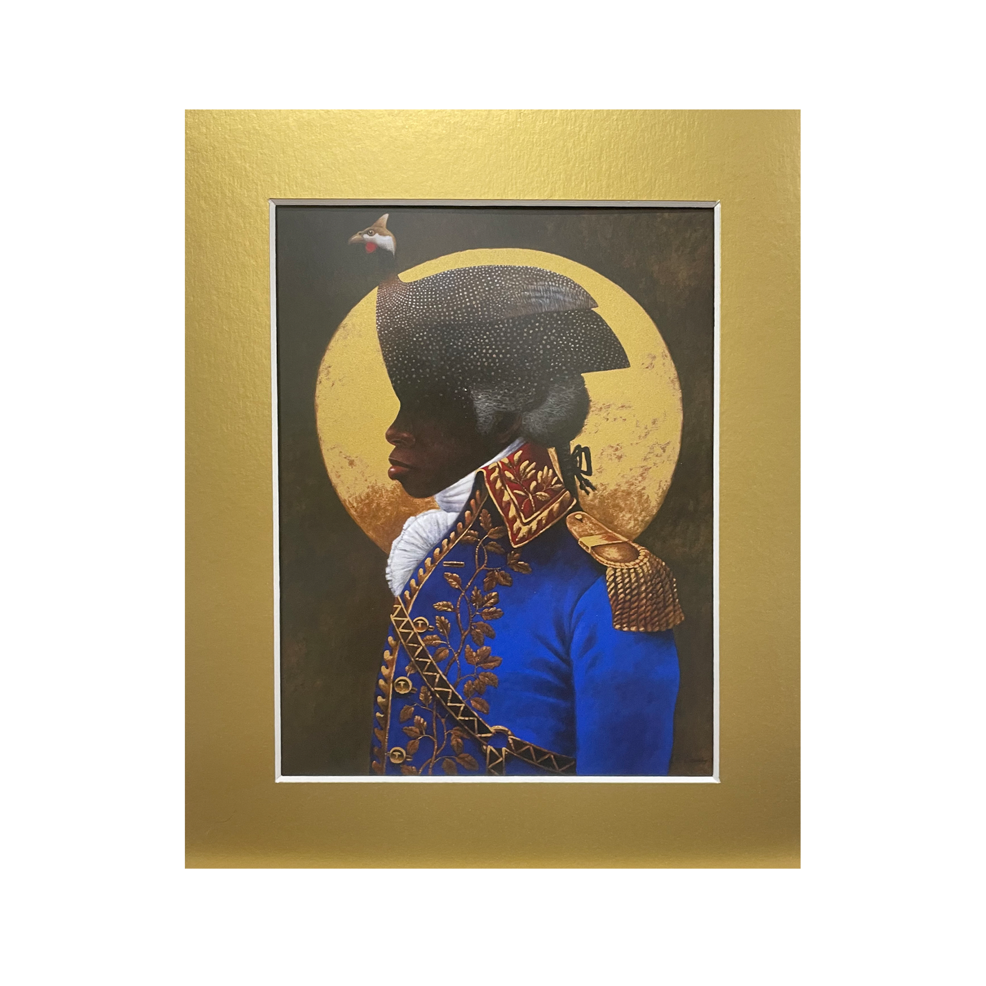 A mounted art print depicting a portrait of Toussaint L'Ouverture, featuring a figure in a blue military uniform with gold accents, against a golden background.