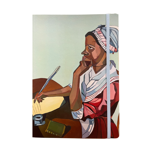 A5 softback notebook with a portrait of Phillis Wheatley on the cover, alongside a elastic closure strap.