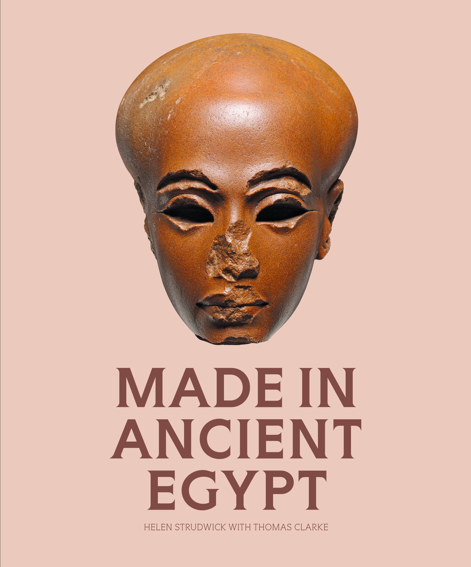 Book cover of 'Made in Ancient Egypt' with an Egyptian mask on a pink background