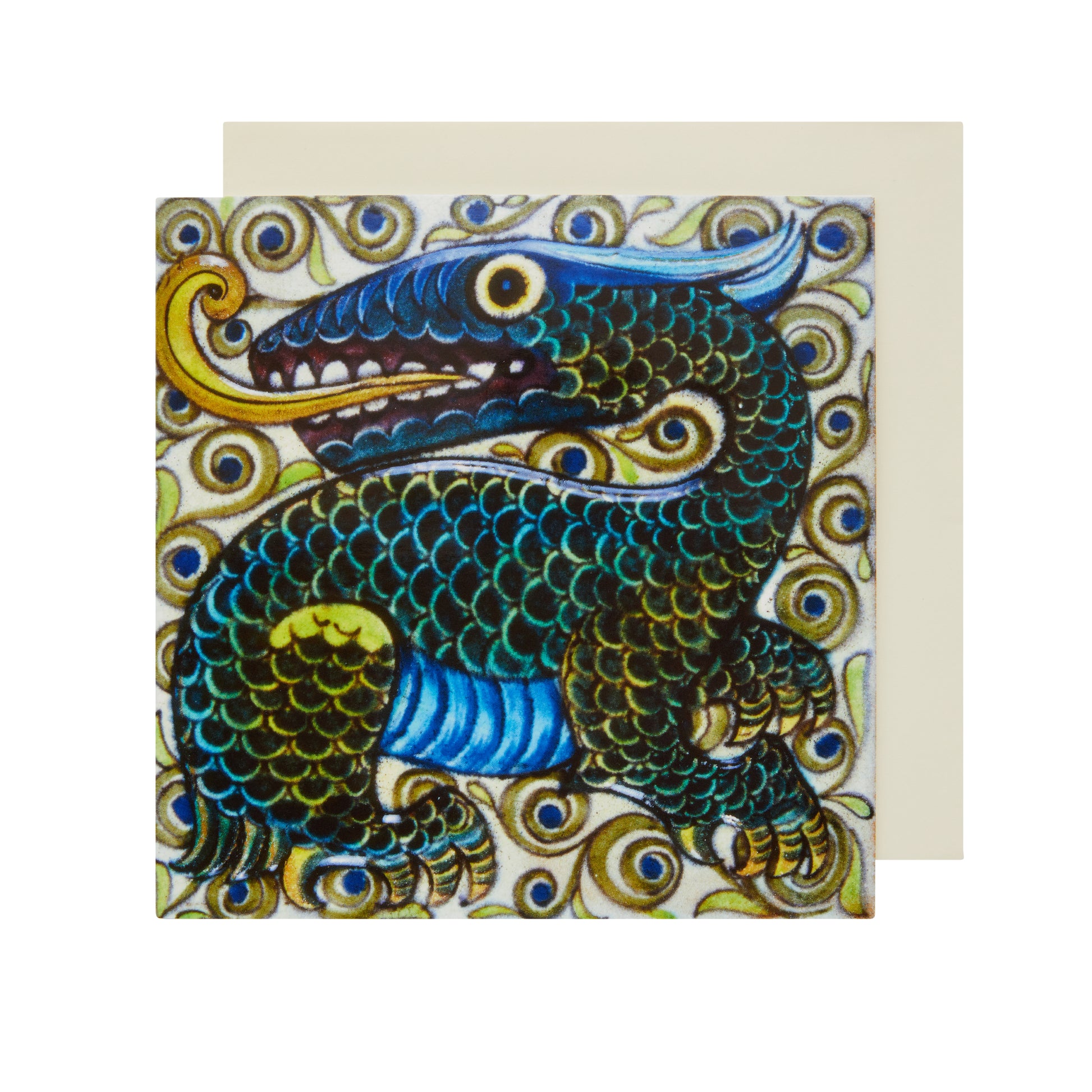 A square greetings card featuring a colorful green, blue and yellow dragon tile design by William De Morgan.