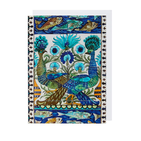 A rectangular greeting card featuring an Arts and Crafts style tile panel design with blue peacocks and intricate patterns in blue, green, and orange.