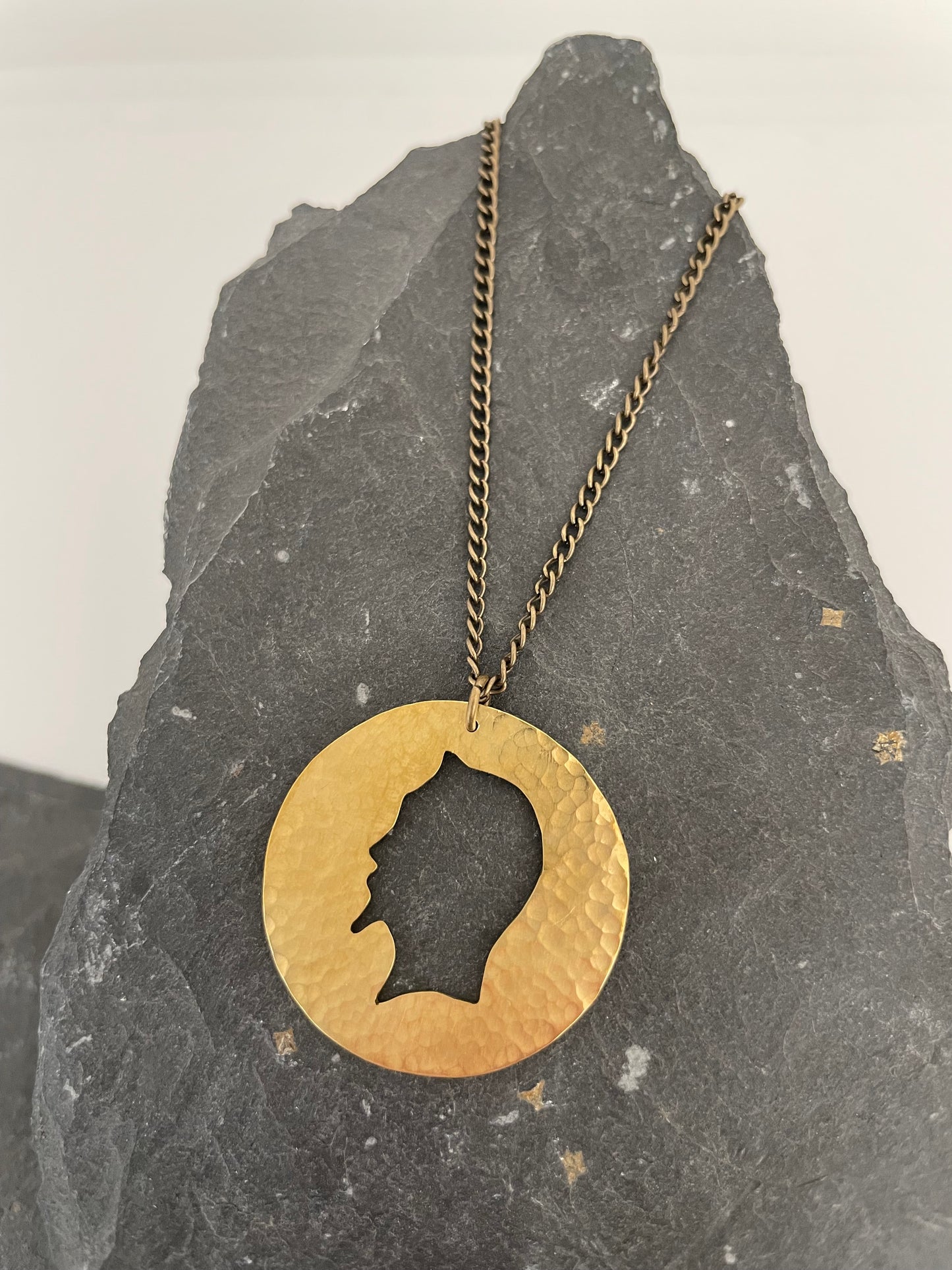 necklace on stone display