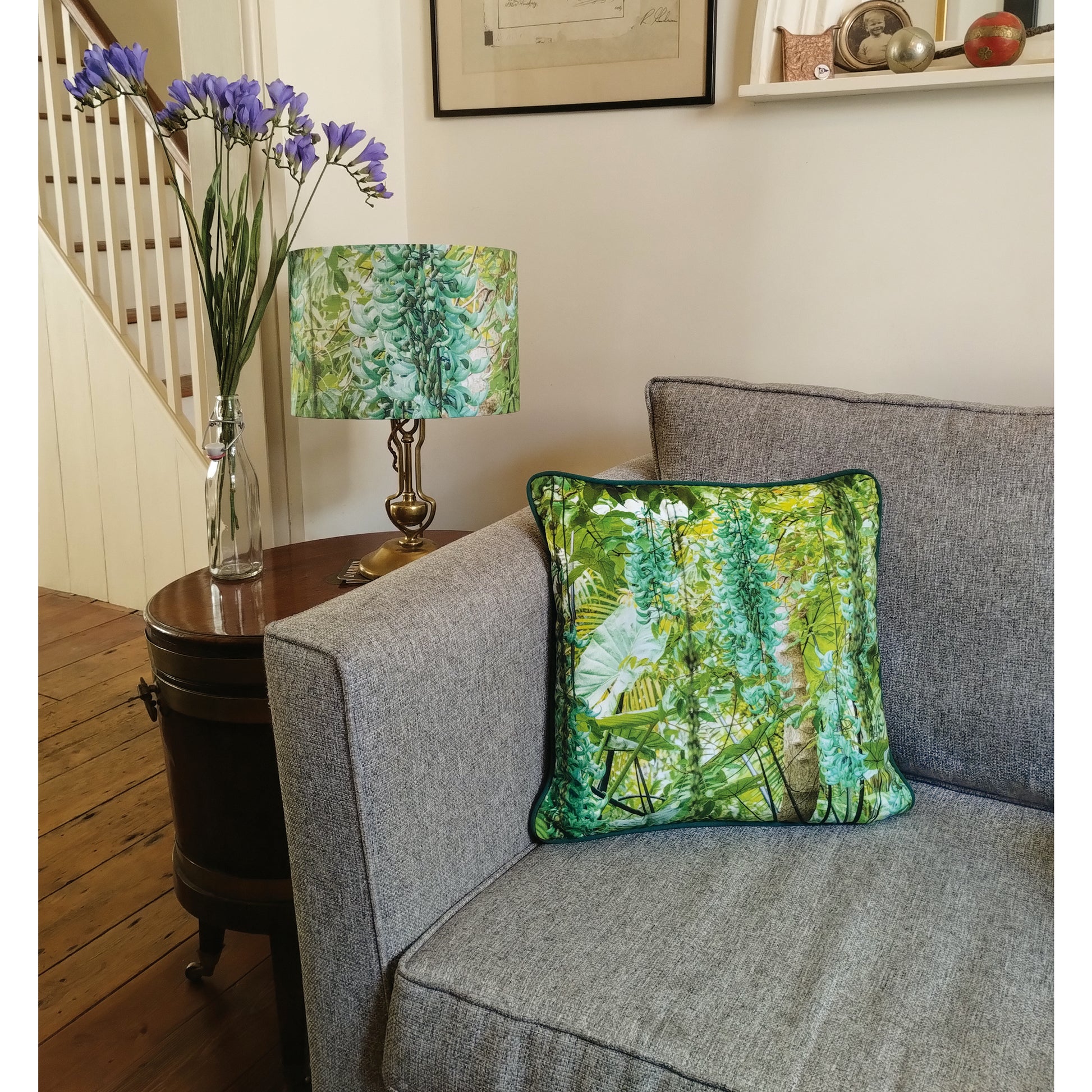 Cushion with Jade Vine design from the Cambridge University Botanic Gardens in domestic setting.