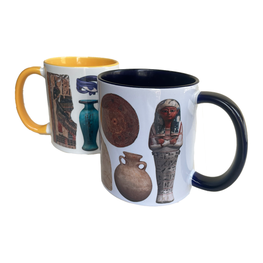Two mugs with Egyptian-themed designs on a white background
