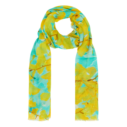 Silk/modal scarf with yellow gingko leaves design on acid blue background. Photography from Cambridge University Botanic Garden.