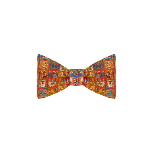 Bow tie with illuminated letters pattern and red borders. From the collection of The Fitzwilliam Museum.