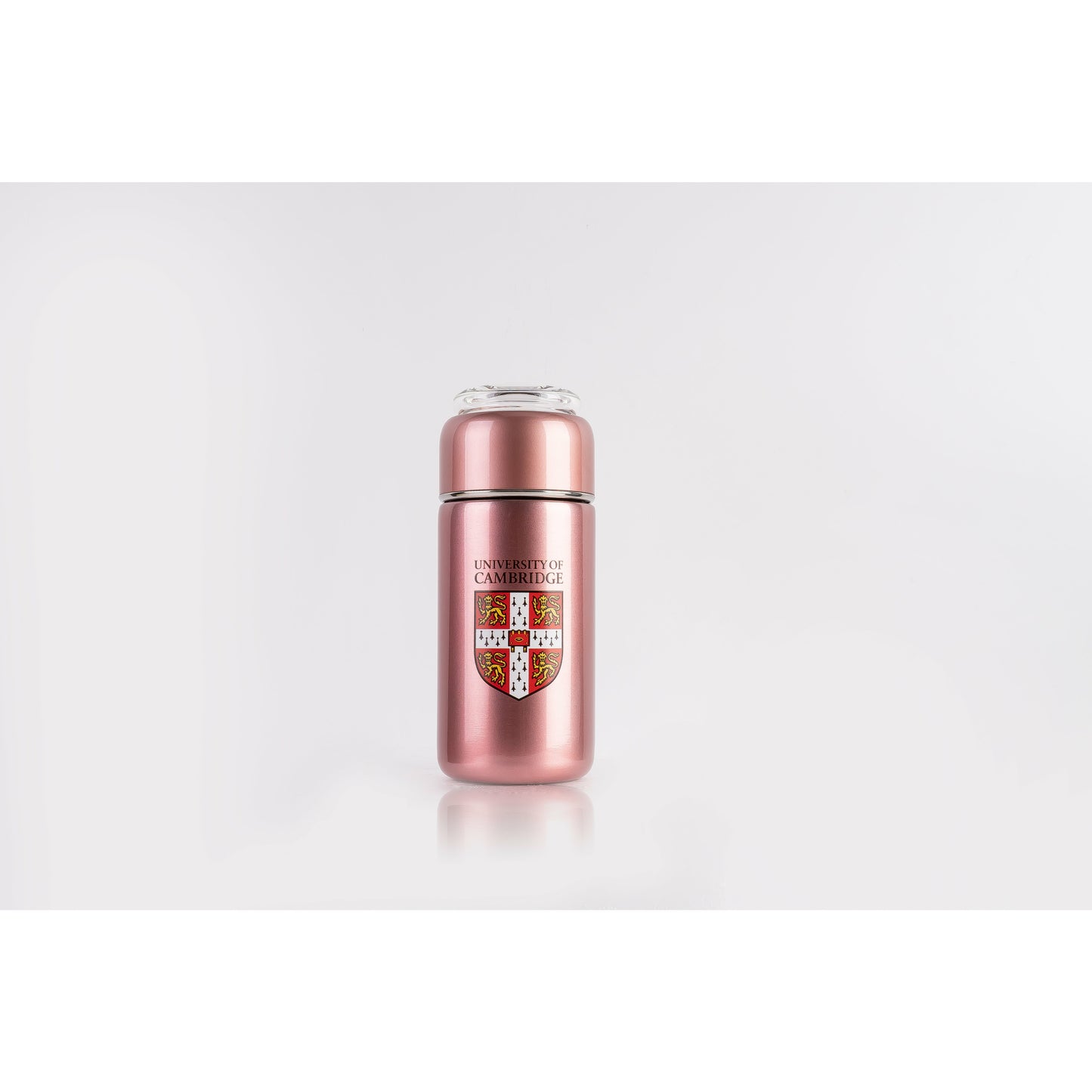 Tea infuser flask with clear glass top, rose gold/metallic pink colour. Decorated with University of Cambridge shield. 